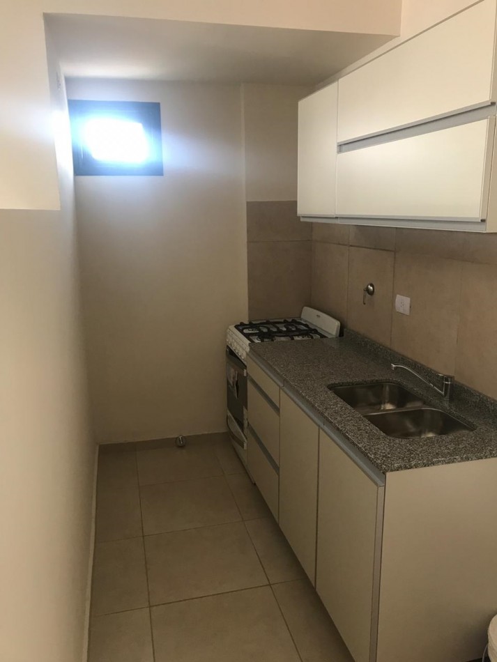 Departamento de un dormitorio, con cochera en venta 